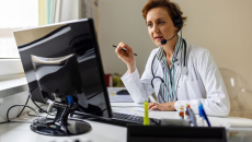 Doctor conducting telehealth appointment