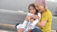 Cancer patient holding child