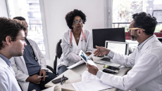 Doctors holding a conference discussion