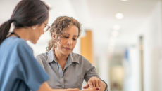A person talking to their doctor.