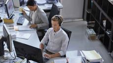 medical coding workers at desk