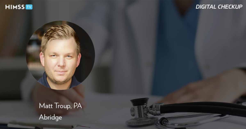 Matt Troup, Abridge_Doctor writing medical forms Photo by Ivan-balvan/iStock/Getty Images Plus
