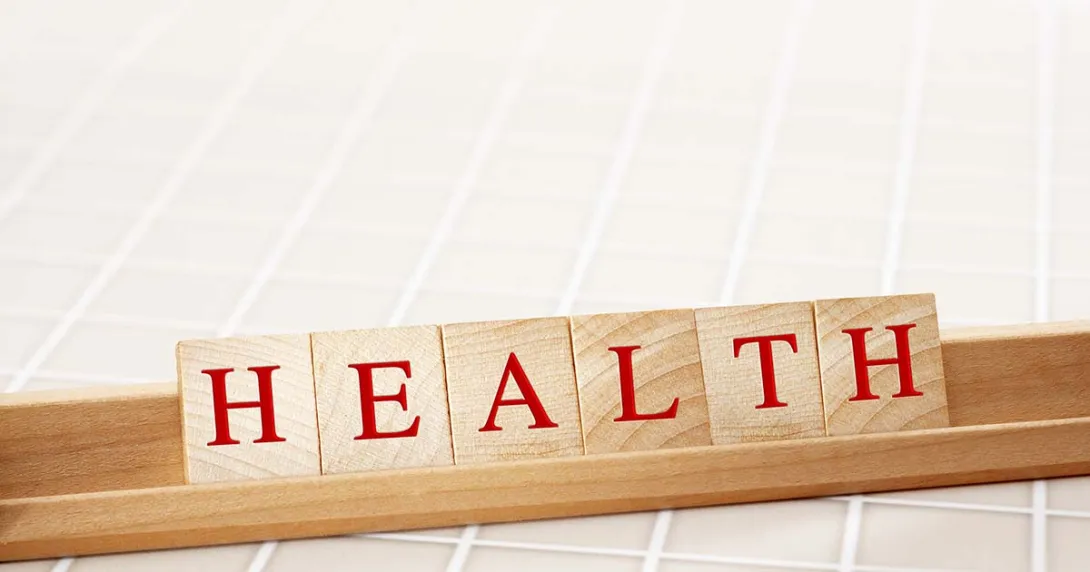 HEALTH spelled in Scrabble game tiles