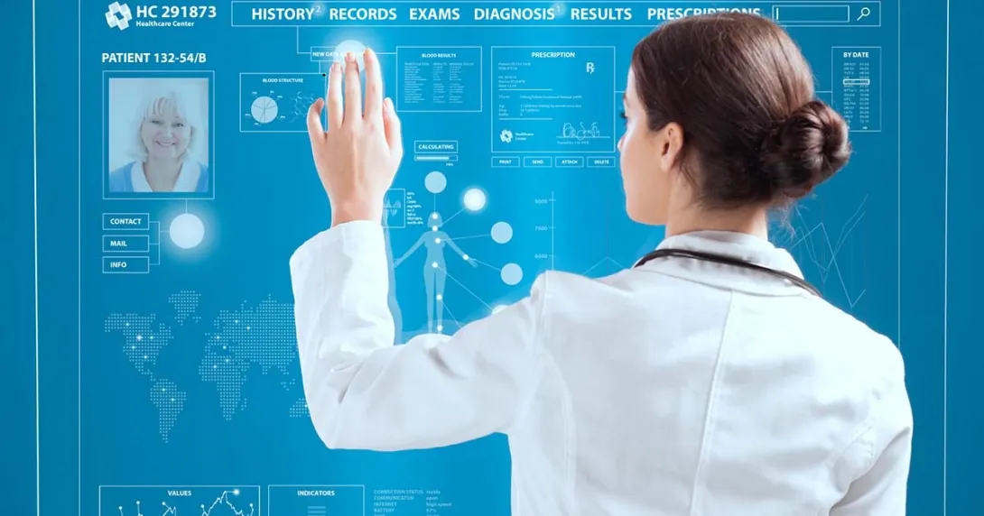 Doctor working on a transparent monitor Doctor working on a transparent monitor