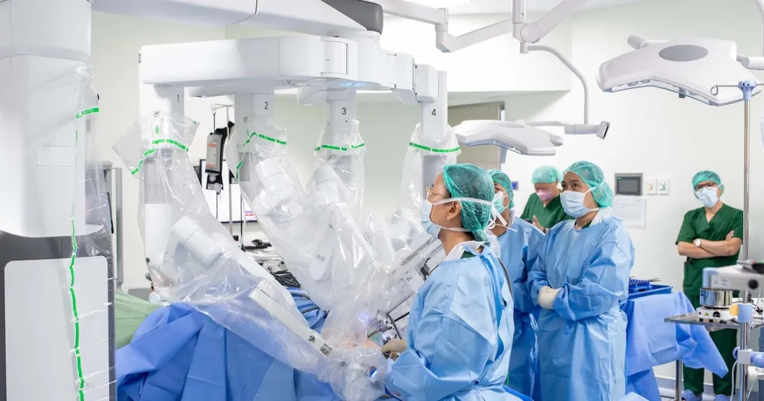 A surgeon operating a robotic-assisted surgery system 