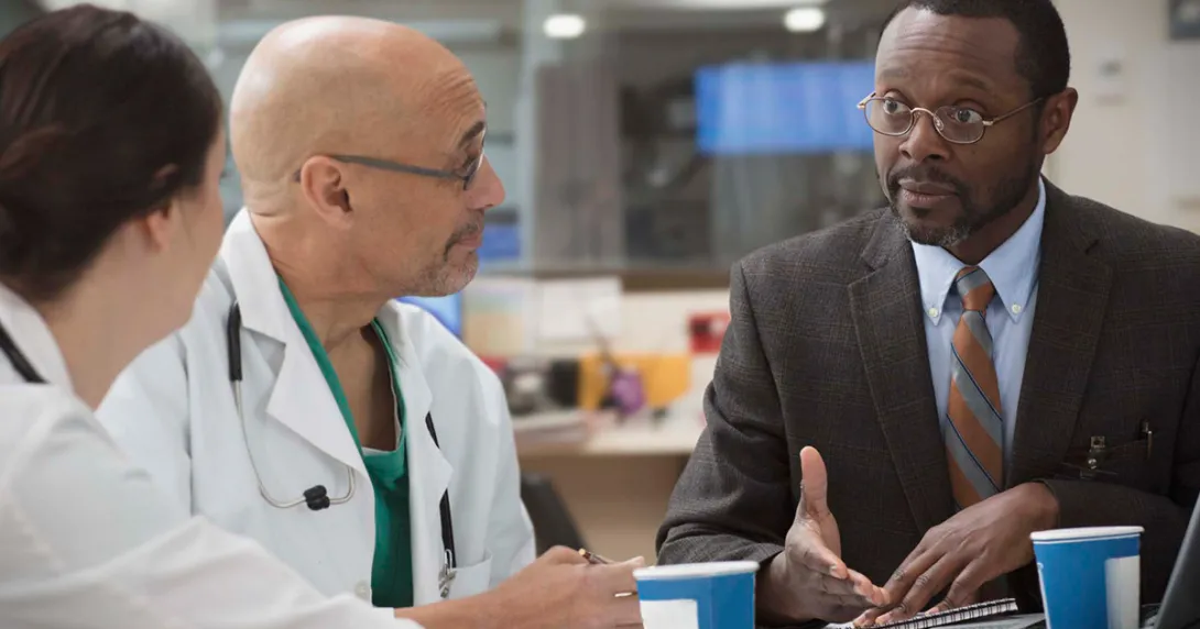 Doctors meeting with executive