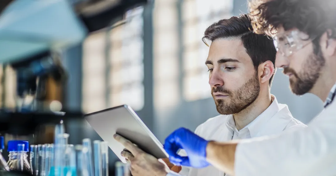 Scientists using a digital tablet