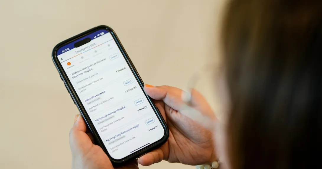 A user checking wait times across NUHS emergency departments on the NUHS mobile application A user checking wait times across NUHS emergency departments on the NUHS mobile application