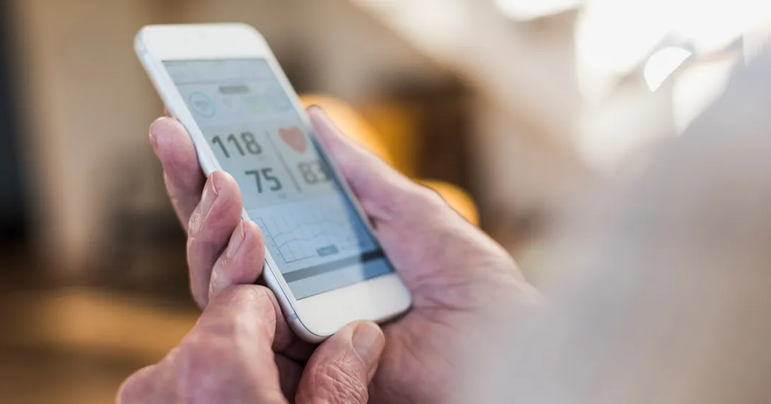 Person using heart rate app on a smartphone