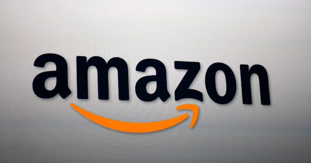 Amazon logo on a gray wall