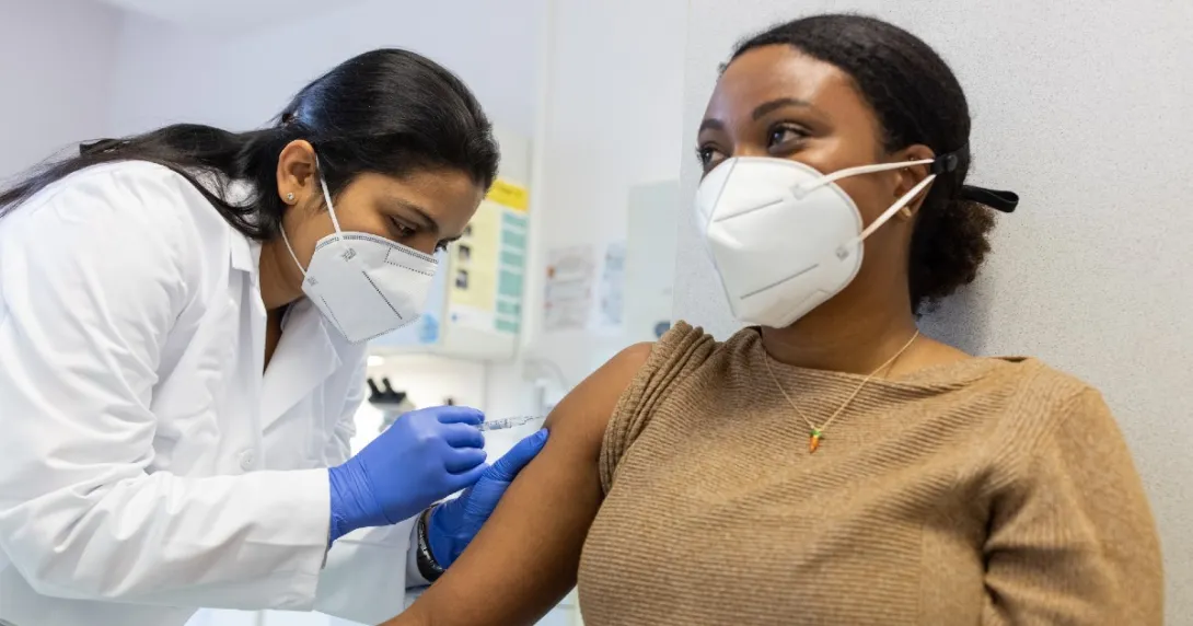 A person receiving the COVID-19 vaccine