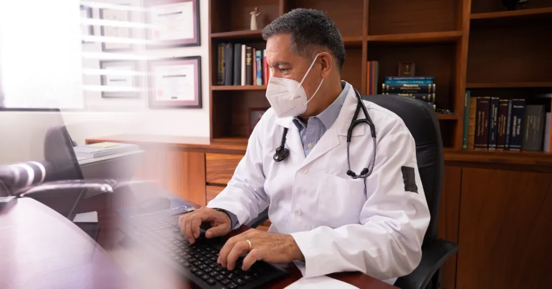 Medical professional at computer