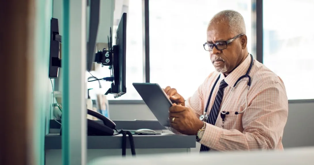 Medical professional looking patient information