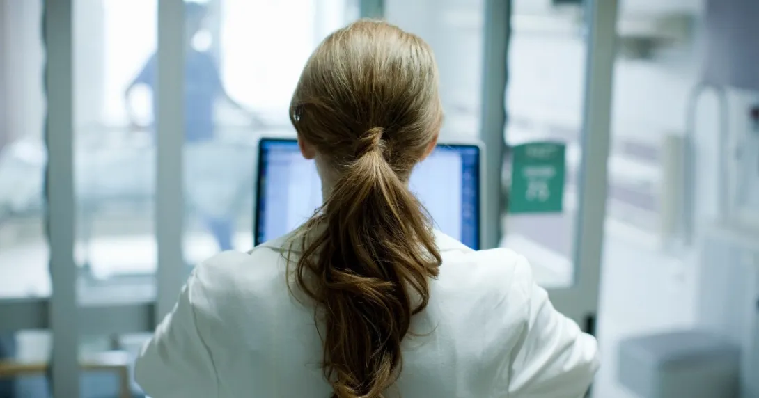 A doctor with a laptop