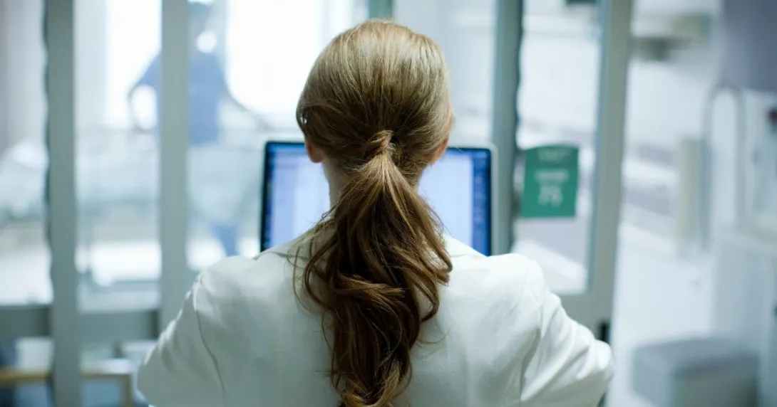 A provider facing a computer screen