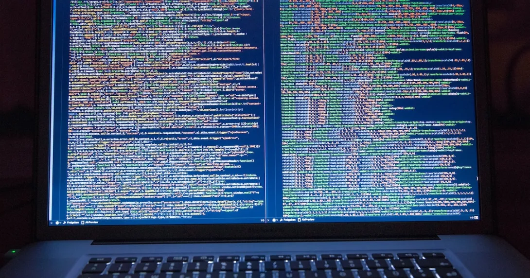 Code on two side-by-side vertical screens Code on two side-by-side vertical screens