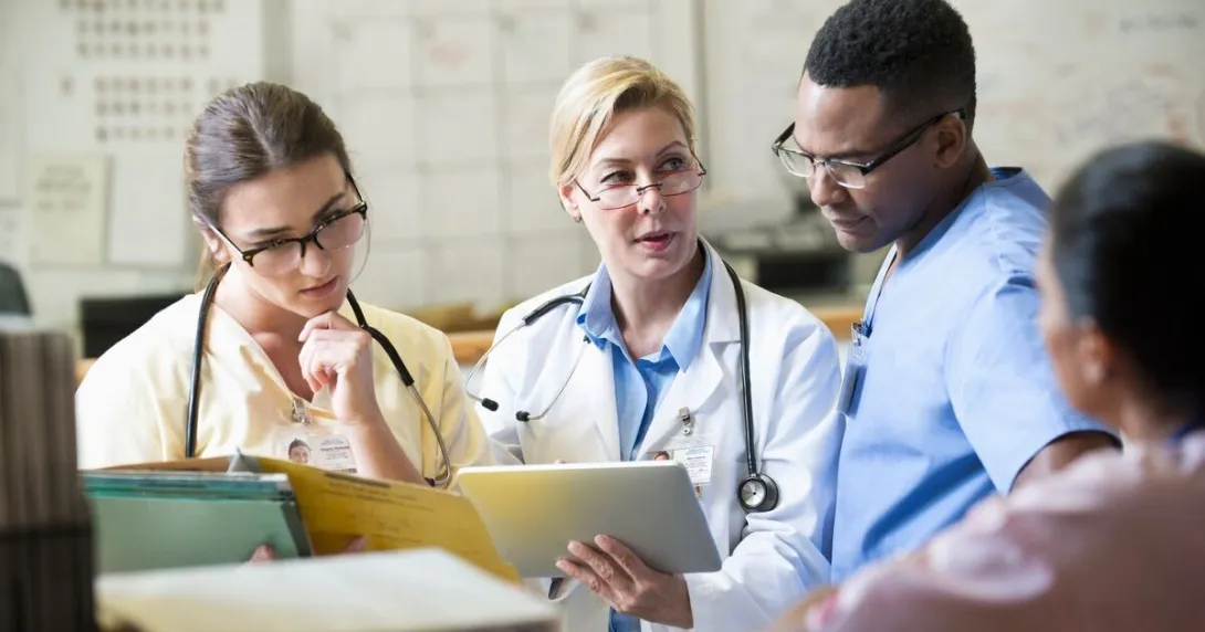 Health staff discussing among themselves
