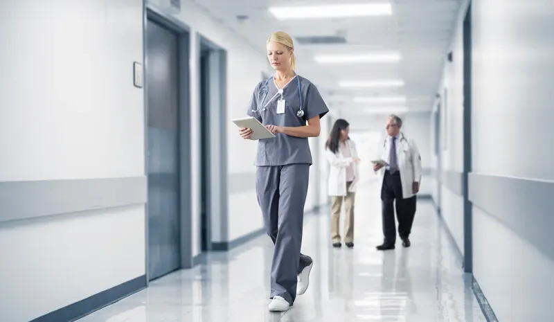 Clinicians in hospital hallway