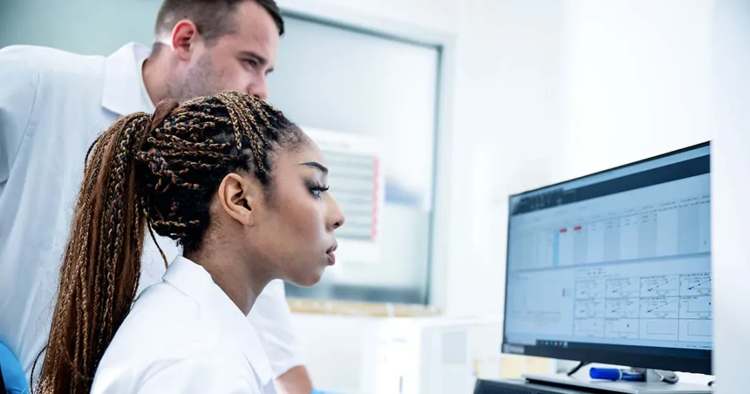Scientists working at computer_Sponsored_Getty-Nitat Termmee