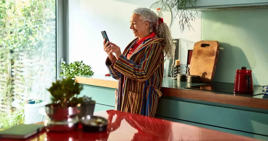 Woman takes a telehealth call at home