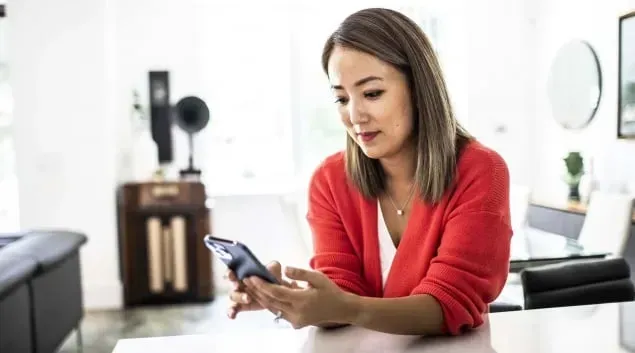 Woman gets health information on her mobile phone