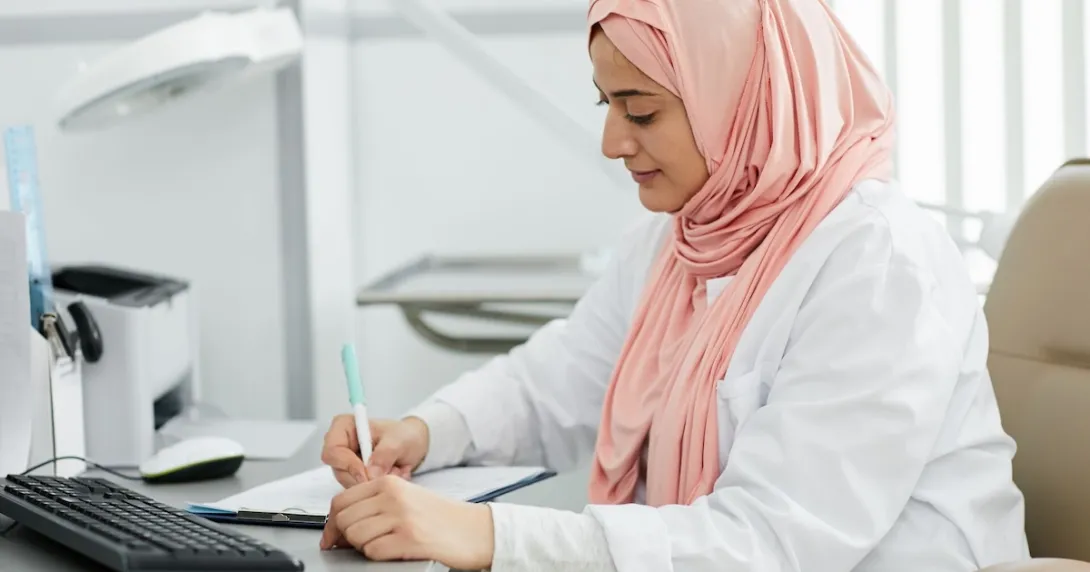 A doctor writing a prescription