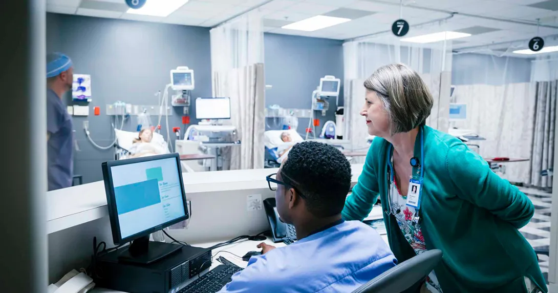 Healthcare workers using a computer