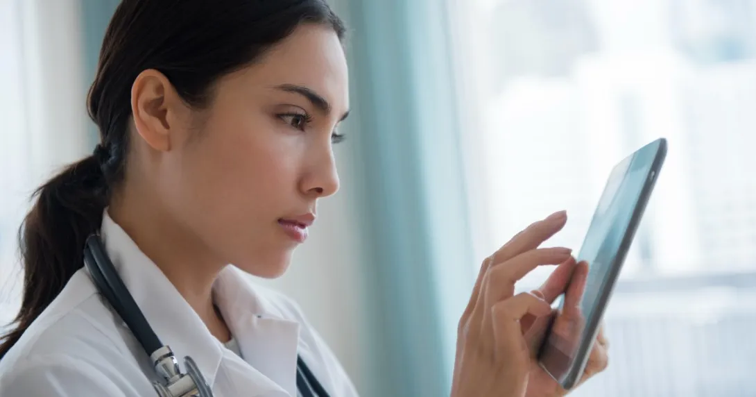 Health professional holding smartphone