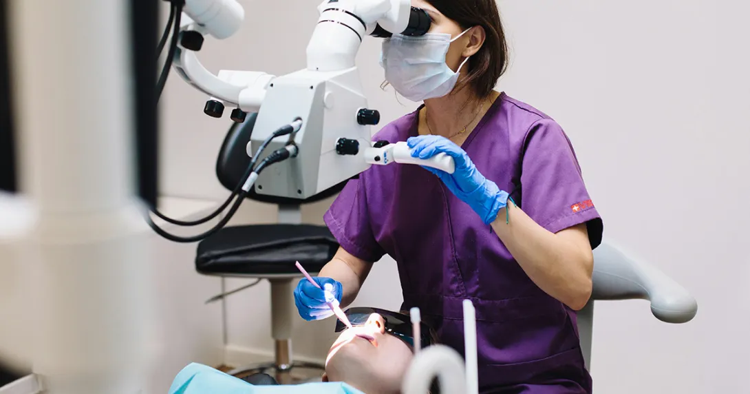 Dentist cares for patient