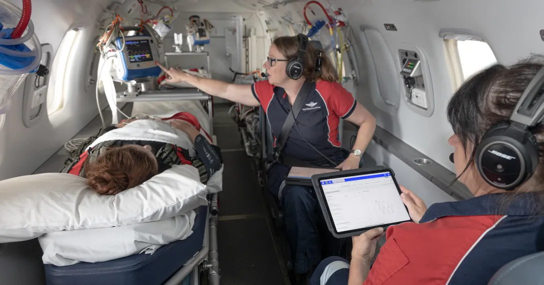 RFDS crews with an emergency patient on an aeromedical flight