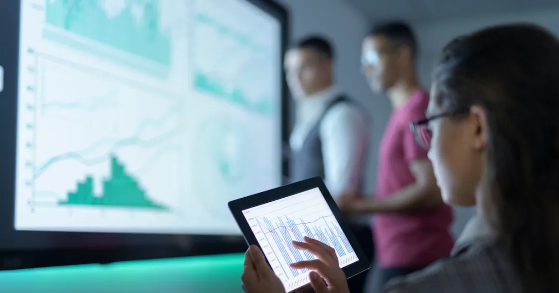 People review screens with charts