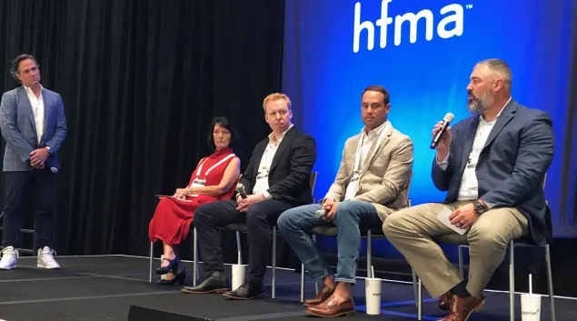 Jim Bohnsack, chief strategy officer of Aspirion moderates a panel discussion that includes Edna Buffington, vice president of revenue cycle at Community Health Services, Spencer Allee, chief AI officer at Aspirion. Bradley Tinnermon, senior vice president of finance shared services for Kaiser Permanente, and Ted Syverson, vice president of revenue cycle for King's Daughters Medical Center.