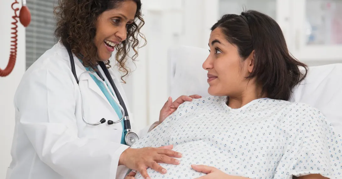 obstetrician checks a maternity patient