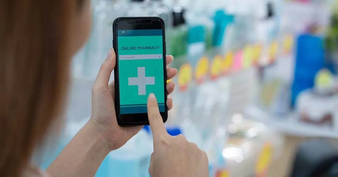 smartphone with online pharmacy on screen