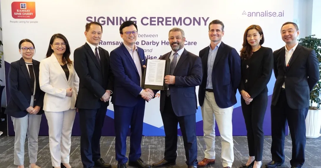 Representatives of Ramsay Sime Darby Health Care and annalise.ai pose during a signing ceremony