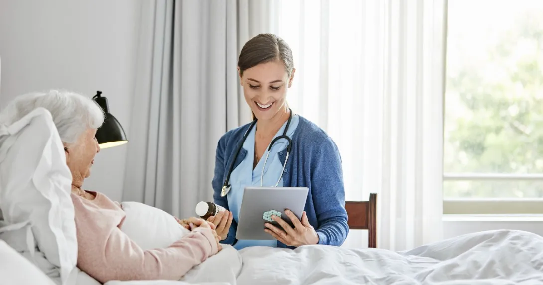 Nurse reviews discharge instructions with patient
