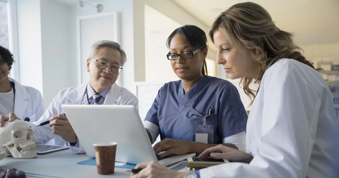 doctors looking at a computer