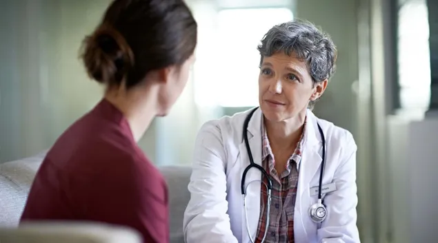 Doctor talking to patient