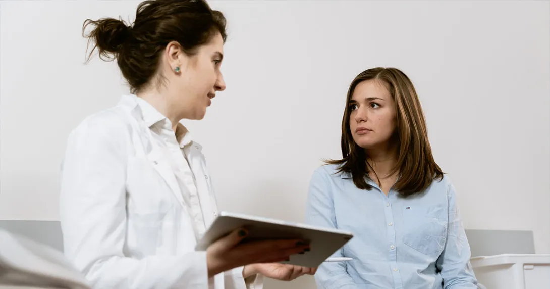 Doctor speaks with patient