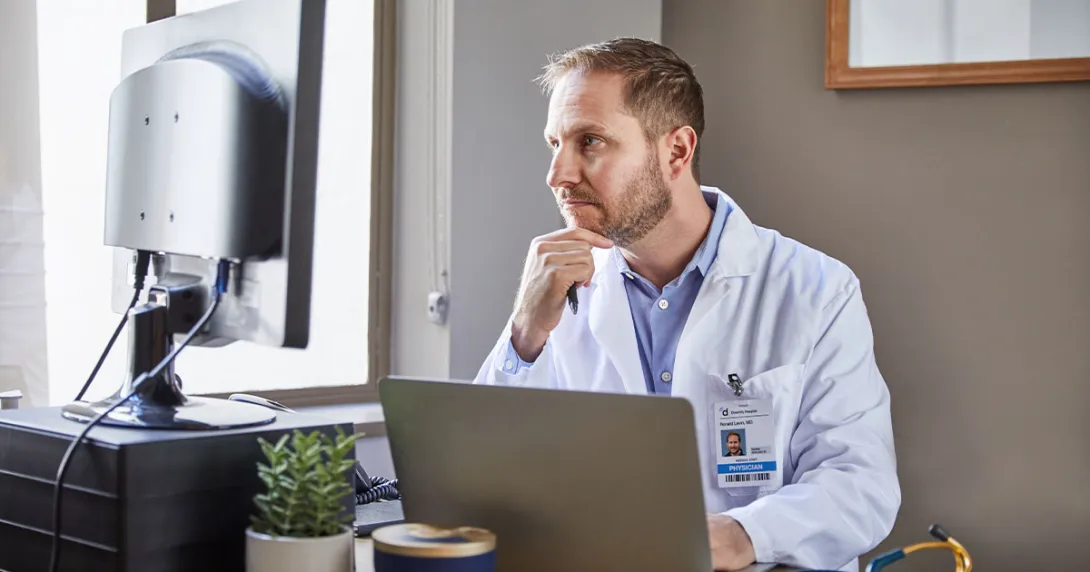 Healthcare professional at desk