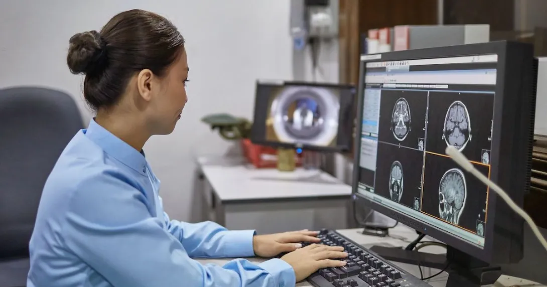 A radiologist examining X-ray images