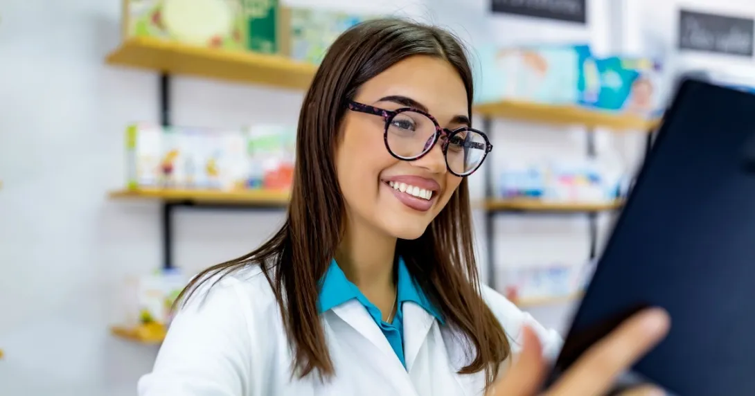 A pharmacist reviewing a digital record