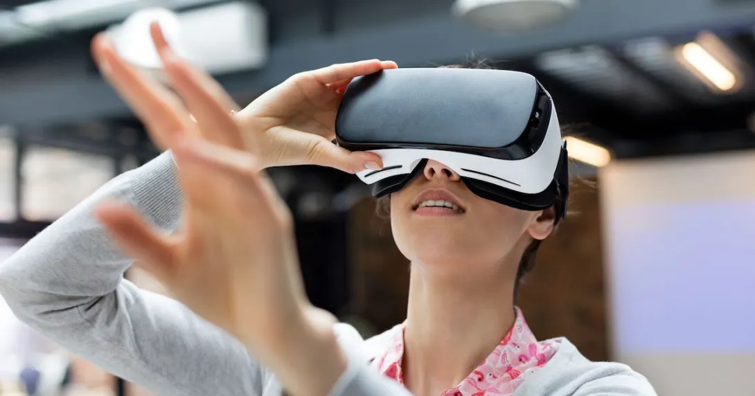 A person using a pair of VR glasses