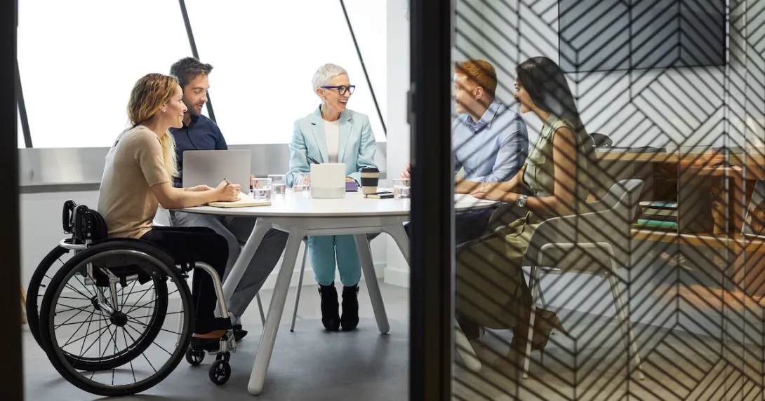 A diverse set of colleagues in a board meeting