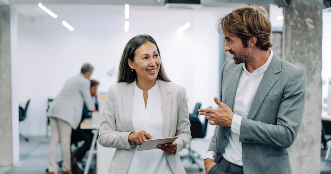 Two coworkers having a discussion